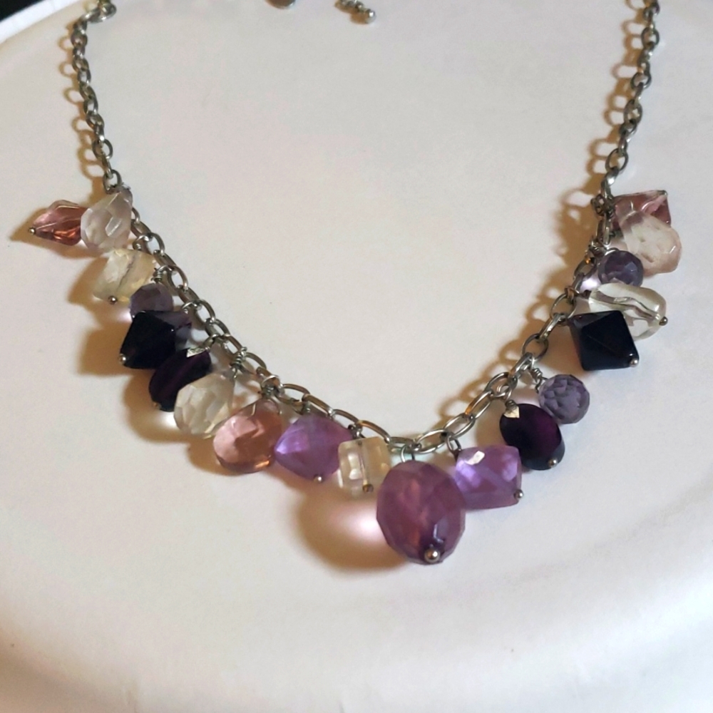 Beautiful Lia Sophia purple necklace and bracelet
